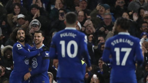 Chelsea's English midfielder Mason Mount (2nd L) celebrates with teammates after scoring his team second goal during the English Premier League football match between Chelsea and Bournemouth at Stamford Bridge in London on December 27, 2022. (Photo by Ian Kington / AFP) 