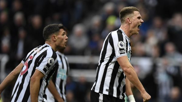 Newcastle United's Swiss defender Fabian Schar (L) and Newcastle United's Dutch defender Sven Botman react after a Fulham penalty was disallowed during the English Premier League football match between Newcastle United and Fulham at St James' Park in Newcastle-upon-Tyne, north-east England on January 15, 2023. (Photo by Oli SCARFF / AFP) 