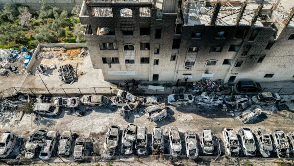 Israeli settlers raze Palestinian town in the West Bank.