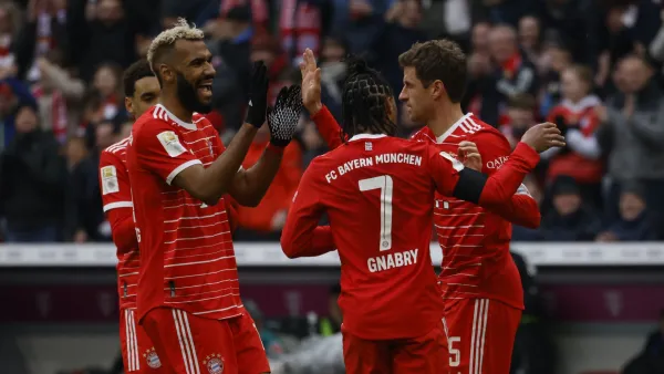 Bayern Munich's German forward Thomas Mueller (R) celebrates scoring his team's first goal with (from L) Bayern Munich's German midfielder Jamal Musiala, Bayern Munich's Cameroonian forward Eric Maxim Choupo-Moting and Bayern Munich's German midfielder Serge Gnabry during the German first division Bundesliga football match between FC Bayern Munich and VfL Bochum 1848 in Munich, southern Germany on February 11, 2023. (Photo by MICHAELA REHLE / AFP)