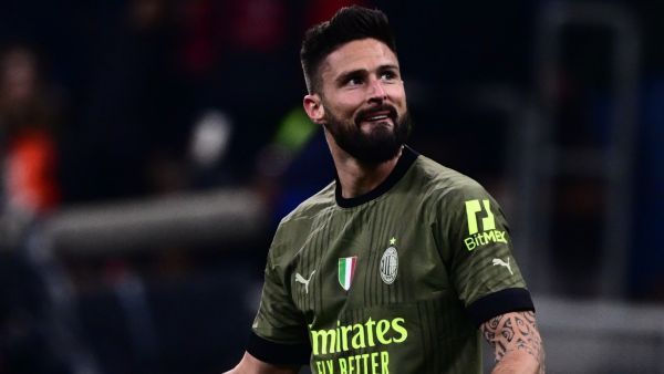AC Milan's French forward Olivier Giroud celebrates after opening the scoring during the Italian Serie A football match between AC Milan and Torino on February 10, 2023 at the San Siro stadium in Milan. (Photo by Marco BERTORELLO / AFP)