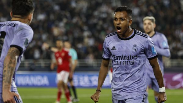 Real Madrid's Brazilian forward Rodrygo (R) celebrates with Real Madrid's Spanish midfielder Dani Ceballos (L) after scoring his team's third goal during the FIFA Club World Cup semi-final football match between Egypt's Al-Ahly and Spain's Real Madrid at the Prince Moulay Abdellah Stadium in Rabat on February 8, 2023. (Photo by Khaled DESOUKI / AFP)