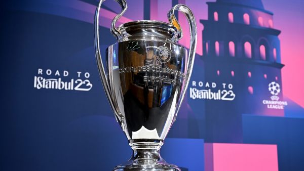 This photograph shows the UEFA Champions League trophy before the draw for the quarter-final, semi-final and final of the 2022-2023 UEFA Champions League football tournament, in Nyon, on March 17, 2023. (Photo by Fabrice COFFRINI / AFP)