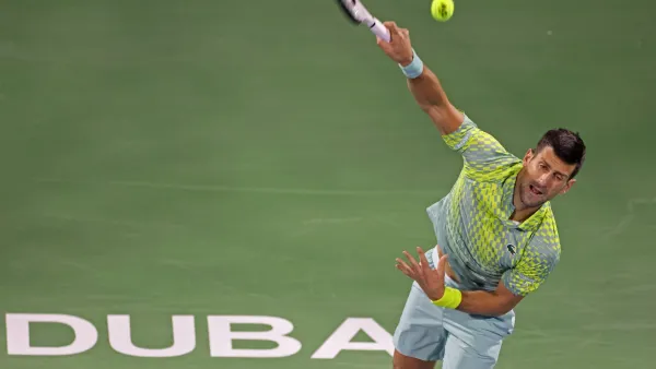 Serbia's Novak Djokovic hits a return against Netherlands' Tallon Griekspoor during their Dubai Duty Free Tennis Championship match in Dubai on March 1, 2023. (Photo by Karim SAHIB / AFP)