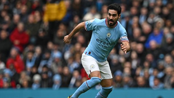 Manchester City's German midfielder Ilkay Gundogan runs with the ball during the English Premier League football match between Manchester City and Newcastle United at the Etihad Stadium in Manchester, north west England, on March 4, 2023. (Photo by Paul ELLIS / AFP)