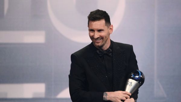 Argentina and Paris Saint-Germain forward Lionel Messi poses on stage after receiving the Best FIFA Men’s Player award during the Best FIFA Football Awards 2022 ceremony in Paris on February 27, 2023. (Photo by FRANCK FIFE / AFP)