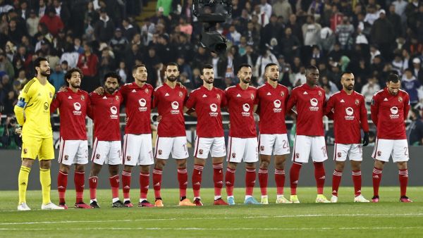 Ahly's players observe a minute of silence for the victims of the massive earthquake that struck Turkey and Syria two days ago, ahead of the FIFA Club World Cup semi-final football match between Egypt's Al-Ahly and Spain's Real Madrid at the Prince Moulay Abdellah Stadium in Rabat on February 8, 2023. (Photo by Khaled DESOUKI / AFP)