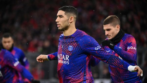 Paris Saint-Germain's Moroccan defender Achraf Hakimi warms up prior to the UEFA Champions League round of 16, 2nd-leg football match FC Bayern Munich v Paris Saint-Germain FC in Munich, southern Germany, on March 8, 2023. (Photo by FRANCK FIFE / AFP)