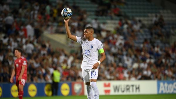 France's forward Kylian Mbappe holds the ball during the UEFA Euro 2024 group B qualification football match between Gibraltar and France at the Algarve stadium in Faro on June 16, 2023. (Photo by FRANCK FIFE / AFP)