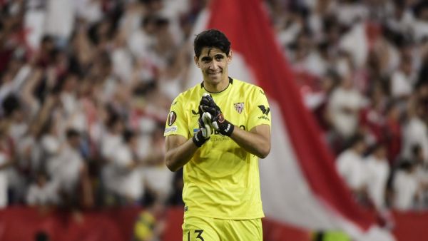 Sevilla's Moroccan goalkeeper Yassine Bounou "Bono" celebrates at the end of the UEFA Europa league quarter final second Leg football match between Sevilla and Manchester United at the Ramon Sanchez-Pizjuan stadium in Seville on April 20, 2023. (Photo by CRISTINA QUICLER / AFP)