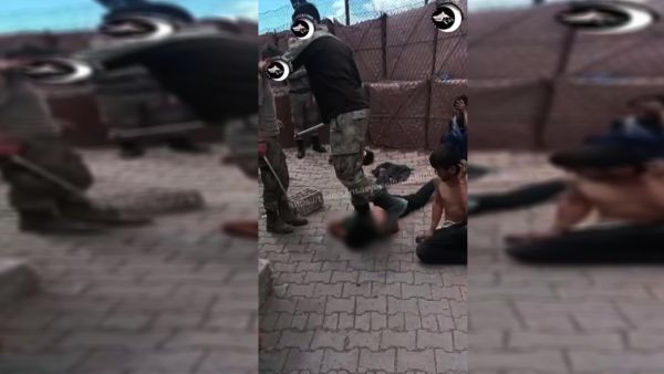 جنود أتراك يعتدون بوحشية على المعتقلين السوريين  جنود أتراك يعتدون بوحشية على المعتقلين السوريين