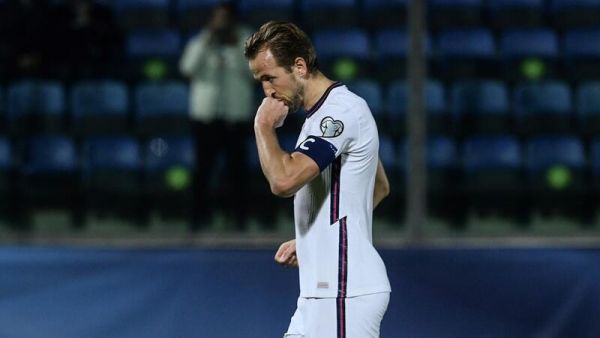 England's forward Harry Kane celebrates after scoring during the FIFA World Cup Qatar 2022 qualification Group I football match between San Marino and England on November 15, 2021 at Olympic stadium in Serravalle, San Marino. (Photo by Filippo MONTEFORTE / AFP)