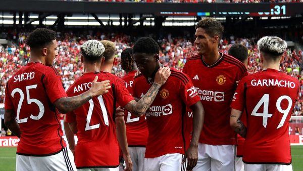 Manchester United's English midfielder Jadon Sancho (L) celebrates scoring his team's first goal with teammates during the friendly football match between Manchester United and Arsenal at MetLife Stadium in East Rutherford, New Jersey, on July 22, 2023. (Photo by Leonardo Munoz / AFP)