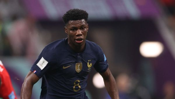 France's midfielder #08 Aurelien Tchouameni runs with the ball during the Qatar 2022 World Cup semi-final football match between France and Morocco at the Al-Bayt Stadium in Al Khor, north of Doha on December 14, 2022. (Photo by ADRIAN DENNIS / AFP)