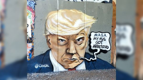 Popular Atlanta Muralist Chris Veal painted the Mug Shot mural