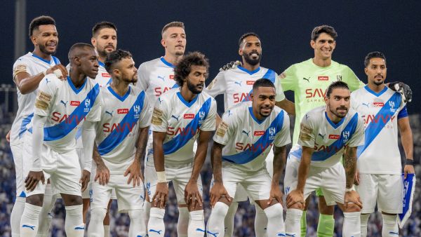 Hilal's players pose for a group picture at the start of the Saudi Pro League football match between Al-Hilal and Al-Raed at the King Abdullah Stadium in Buraydah on August 24, 2023. (Photo by AFP)