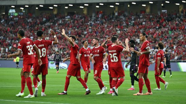 Liverpool's Dutch defender Virgil van Dijk (2nd R) celebrates with teammates after scoring a goal against Bayern Munich during the Singapore Festival of Football pre-season friendly match in Singapore on August 2, 2023. (Photo by MOHD RASFAN / AFP)
