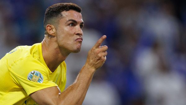 Nassr's Portuguese forward #07 Cristiano Ronaldo celebrates scoring his team's first goal during the 2023 Arab Club Champions Cup final football match between Saudi Arabia's Al-Hilal and Al-Nassr at the King Fahd Stadium in Taif on August 12, 2023. (Photo by AFP)