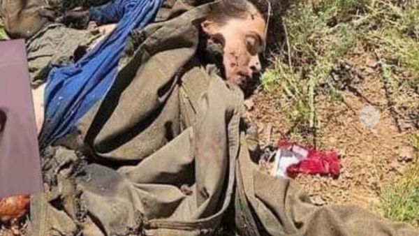 جثة مقاتلة كردية على جبهة بلدة ذيبان