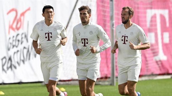 (L-R) Bayern Munich's South Korean defender #03 Min-Jae Kim, Bayern Munich's midfielder #08 Leon Goretzka (L) and Bayern Munich's English midfielder #09 Harry Kane (R) jog during the training session at the team trainings ground in Munich, southern Germany, on September 19, 2023, on the eve of the UEFA Champions League Group A football match between Bayern Munich and Manchester United. (Photo by Christof STACHE / AFP)