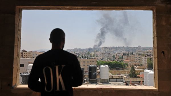 A video of an Israeli drone broadcasting ominous messages for Palestinians circulated on social media. (Jaafar Ashtiyeh/AFP)