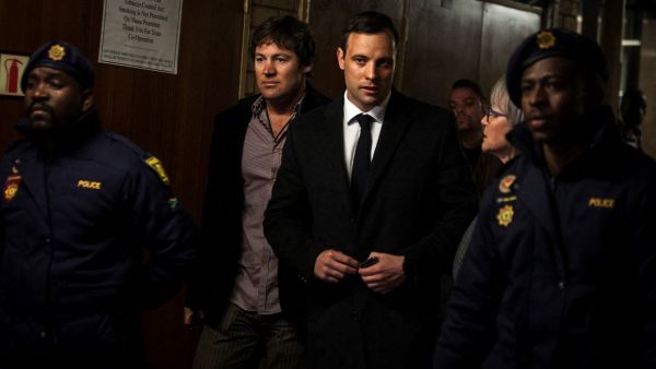 South African Paralympian Oscar Pistorius arrives at the Pretoria High Court for sentencing procedures in his murder trial. (John Wessels/ AFP)