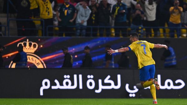 Nassr's Portuguese forward #07 Cristiano Ronaldo celebrates after scoring a goal during the Saudi Pro League football match between Al-Nassr and Al-Akhdoud in Riyadh's Al-Awal Park Stadium on November 24, 2023. (Photo by AFP)