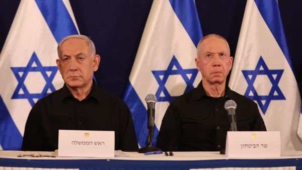 Israeli Prime Minister Benjamin Netanyahu (L) and Defence Minister Yoav Gallant attend a press conference in the Kirya military base in Tel Aviv on October 28, 2023 amid ongoing battles between Israel and the Palestinian group Hamas. 