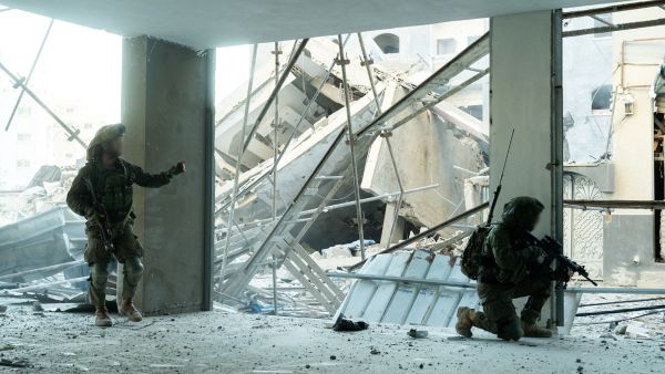 This handout picture released by the Israeli army on December 23, 2023 shows soldiers operating in the Gaza Strip amid continuing battles between Israel and the Palestinian  resistance, Hamas.