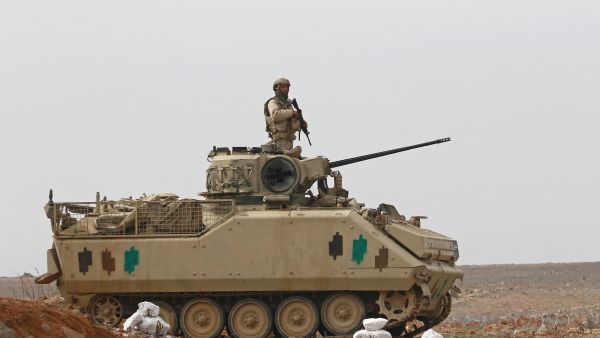 A picture taken during a tour origanized by the Jordanian Army shows soldiers patrolling along the border with Syria to prevent trafficking, on February 17, 2022.