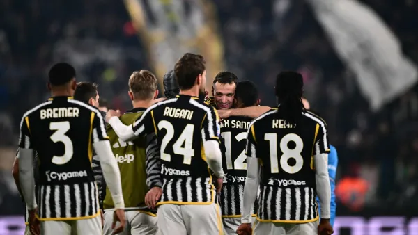 Juventus' Italian defender #04 Federico Gatti celebrates with teammates after winning the Italian Serie A football match between Juventus and Napoli, at The Allianz Stadium, in Turin on December 8, 2023. (Photo by Marco BERTORELLO / AFP)