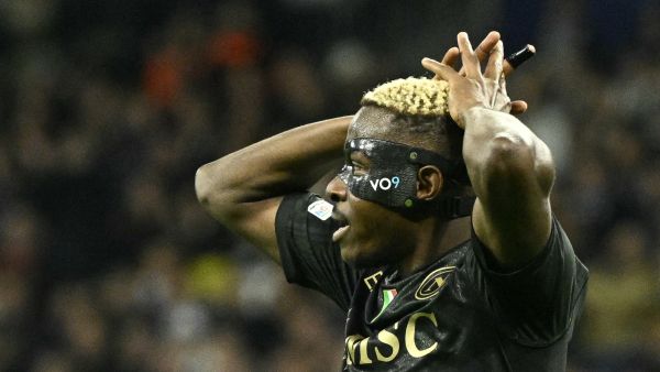Napoli's Nigerian forward #09 Victor Osimhen reacts during the UEFA Champions League first round group C football match between Real Madrid CF and SSC Naples at the Santiago Bernabeu stadium in Madrid on November 29, 2023. (Photo by JAVIER SORIANO / AFP)