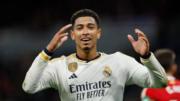 Real Madrid's English midfielder #5 Jude Bellingham reacts during the Spanish league football match between Real Madrid CF and Granada FC at the Santiago Bernabeu stadium in Madrid on December 1, 2023. (Photo by OSCAR DEL POZO / AFP)