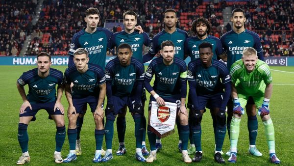 Arsenal's team players pose for a photograph ahead of a UEFA Champions League group B football match between PSV Eindhoven and Arsenal FC at the Philips Stadium in Eindhoven, on December 12, 2023. (Photo by KENZO TRIBOUILLARD / AFP)