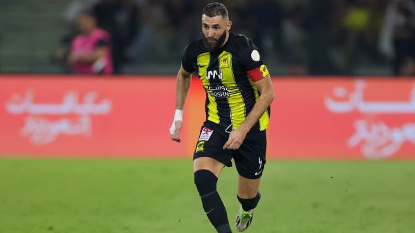 Ittihad's French forward #09 Karim Benzema runs with the ball during the Saudi Pro League football match between Al-Ittihad and Al-Nassr at King Abdullah Sports City Stadium in Jeddah on December 26, 2023. (Photo by AFP)