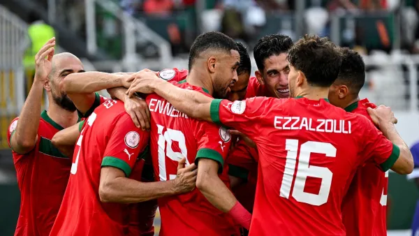 Morocco's players celebrate scoring their team's first goal during the Africa Cup of Nations (CAN) 2024 group F football match between Morocco and Tanzania at Stade Laurent Pokou in San Pedro on January 17, 2024. (Photo by SIA KAMBOU / AFP)