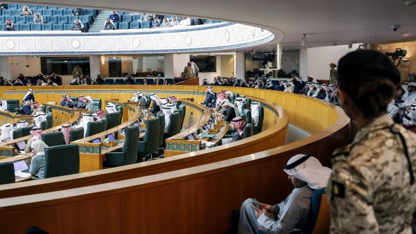 Female security guards stand by as Kuwaiti lawmakers attend a parliament session at the National Assembly in Kuwait City on February 6, 2024.