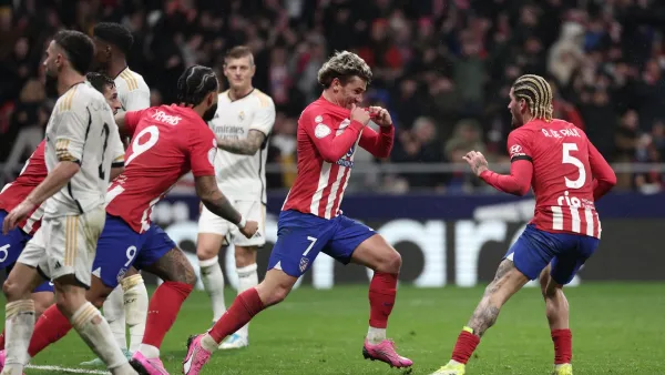 Atletico Madrid's French forward #07 Antoine Griezmann (2R) celebrates scoring his team's third goal during the Spanish Copa del Rey (King's Cup) football match between Club Atletico de Madrid and Real Madrid CF at the Metropolitano stadium in Madrid on January 18, 2024. (Photo by Thomas COEX / AFP)