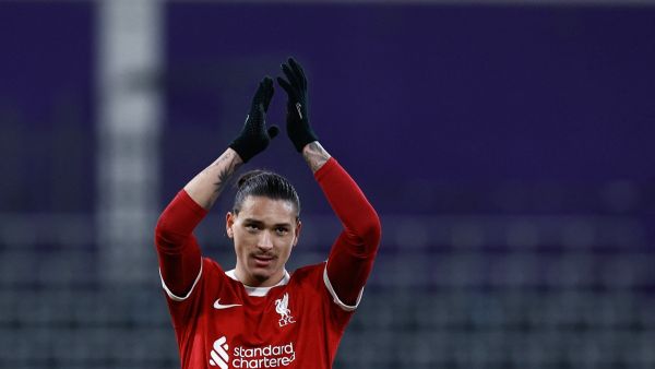 Liverpool's Uruguayan striker #09 Darwin Nunez applauds at the end of the UEFA Europa League football match between Union Saint Gilloise and Liverpool FC at the Lotto Park in Brussels on December 14, 2023. (Photo by Kenzo TRIBOUILLARD / AFP)