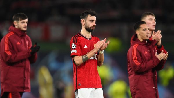 Manchester United's Portuguese midfielder #08 Bruno Fernandes reacts after the UEFA Champions League group A football match between Manchester United and FC Bayern Munich at Old Trafford stadium in Manchester, north west England, on December 12, 2023. (Photo by PETER POWELL / AFP)