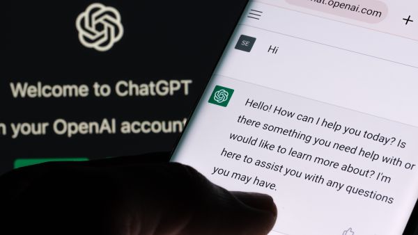 ChatGPT chat bot screen seen on smartphone and laptop display with Chat GPT login screen on the background (Shutterstock) Microsoft, OpenAI expose hackers using ChatGPT
