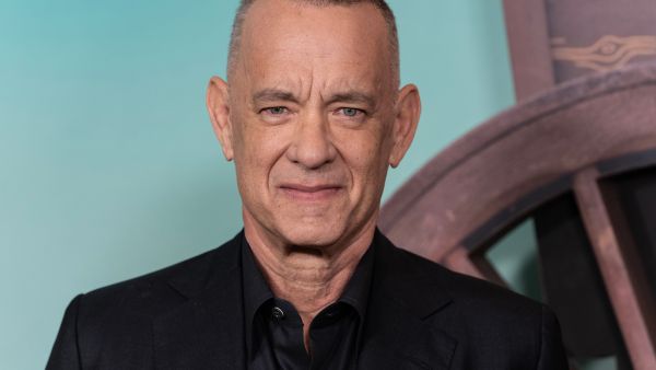 QAnon is a conspiracy theory that accused Tom Hanks of pedophilia. (Lev Radin/ Shutterstock)