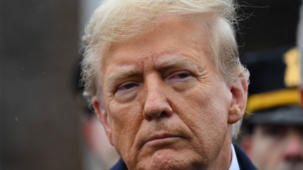 Trump attends wake of slain NYPD officer, taking aim at Biden's policies