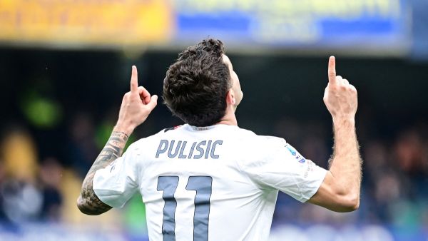 AC Milan's American forward #11 Christian Pulisic celebrates after scoring his team second goal during the Italian Serie A football match between Hellas Verona and AC Milan, at the Marcantonio Bentegodi stadium, in Verona, on March 17, 2024. (Photo by Piero CRUCIATTI / AFP)