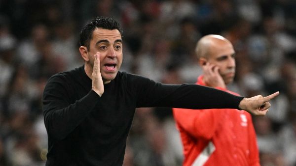 تشافي (Photo by JAVIER SORIANO / AFP)