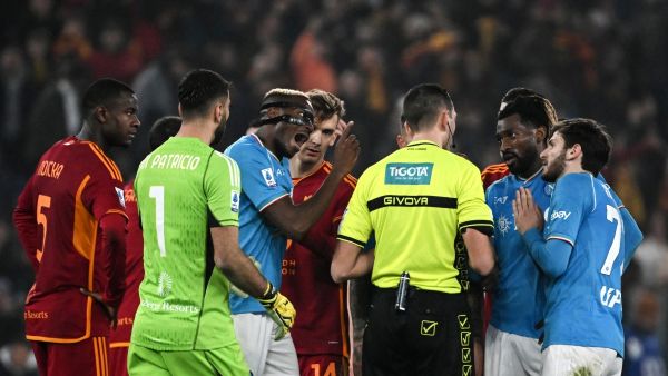 Napoli's Nigerian forward #09 Victor Osimhen (C) reacts during the Italian Serie A football math between Roma and Napoli at the Olympic stadium in Rome on December 23, 2023. (Photo by TIZIANA FABI / AFP)