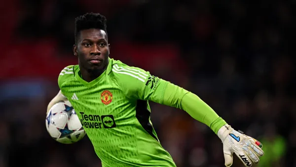 Manchester United's Cameroonian goalkeeper #24 Andre Onana throws the ball during the UEFA Champions League Group A football match between Manchester United and FC Copenhagen at Old Trafford, in Manchester, north-west England, on October 24, 2023. (Photo by Paul ELLIS / AFP)