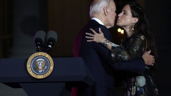 US President Joe Biden kisses his daughter Ashley Biden