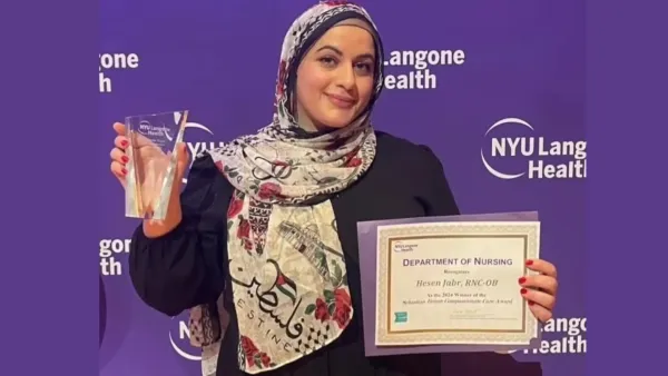 Hesen Jabr, a Palestinian American labor and delivery nurse, receiving an award in recognition for her compassion towards patients at NYU Longone Hospital (Instagram @iknowwhythejaybirdsings)