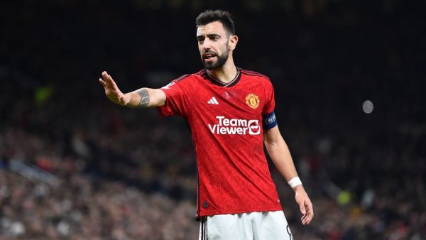 Manchester United's Portuguese midfielder #08 Bruno Fernandes gestures during the UEFA Champions League group A football match between Manchester United and FC Bayern Munich at Old Trafford stadium in Manchester, north west England, on December 12, 2023. (Photo by PETER POWELL / AFP)